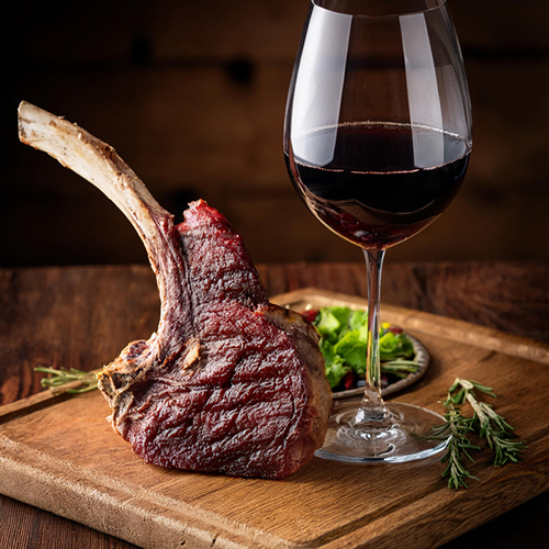Red Wine Paired with Tomahawk Steak Red Wine Paired with Tomahawk Steak
